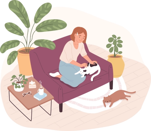 Don't Skip the Basics Cat owner with two cats relaxing in a household with no stress, anxiety, fear, or aggression